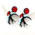 Pair of earrings with red, black, and light blue design on a white background