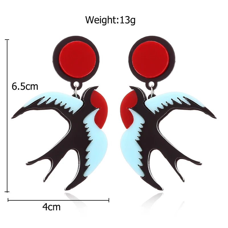 Pair of earrings with red and blue design, shown with measurements on a white background.