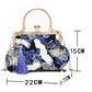Blue floral handbag with tassel and measurements on a white background