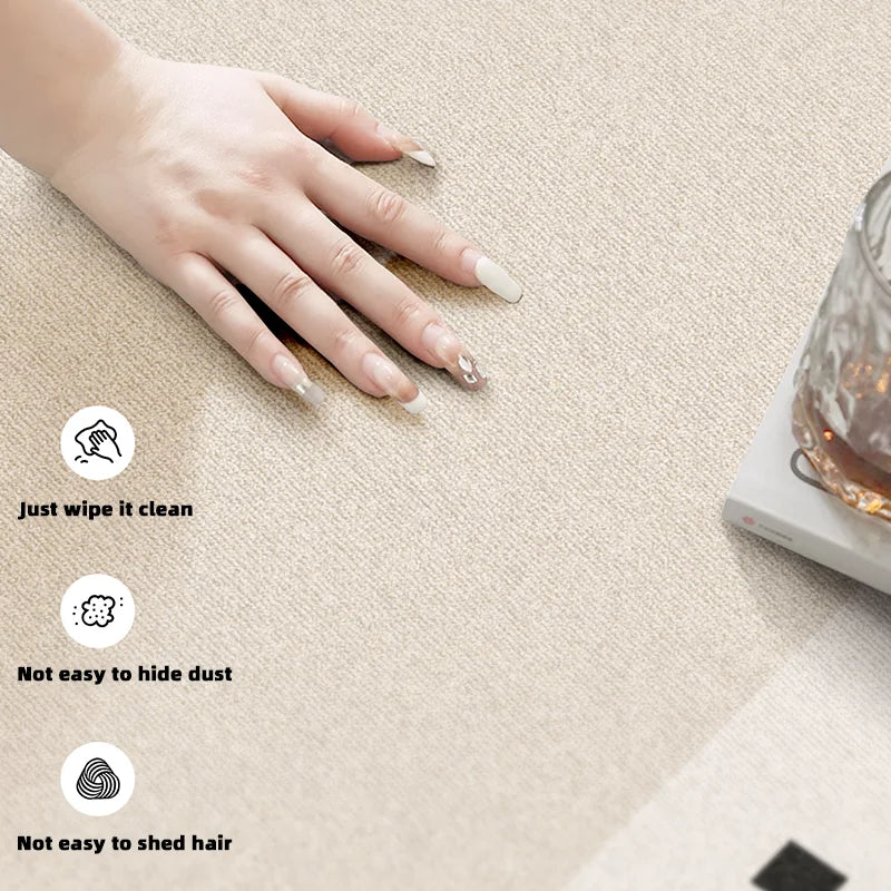 Hand touching a textured surface with cleaning instructions displayed.