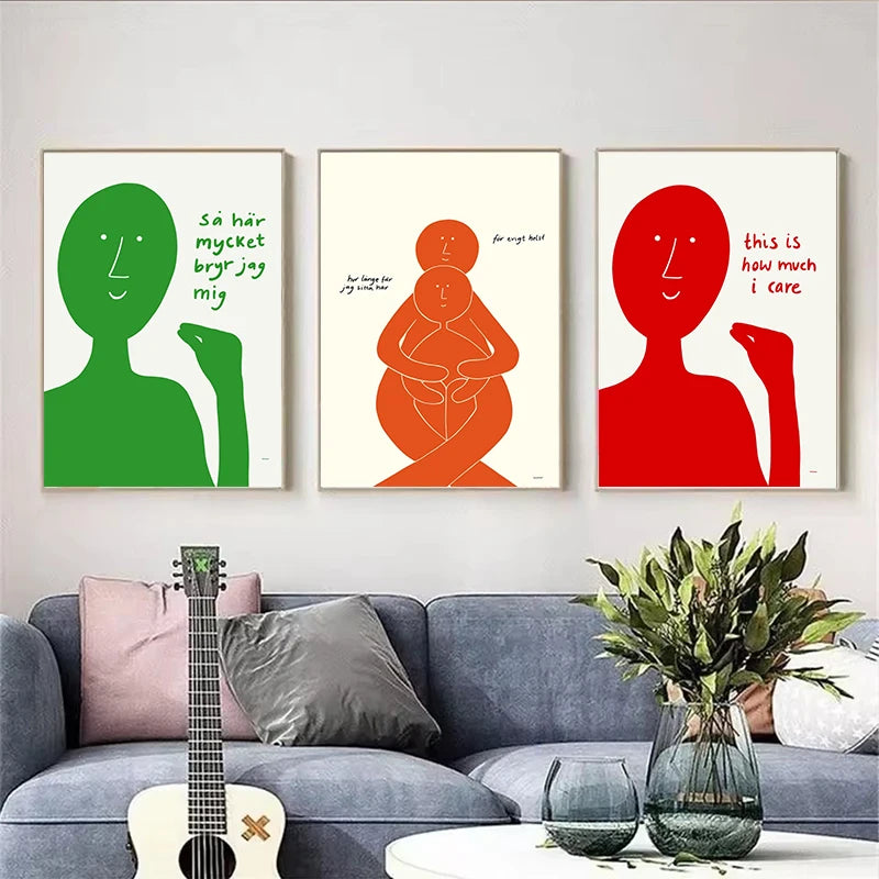 Three colorful abstract art prints on a wall above a gray sofa with decorative elements.