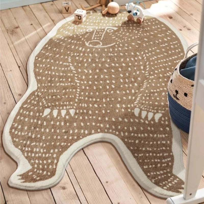 Bear-shaped rug on a wooden floor with toys around