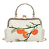 Handbag with orange and green design on a white background