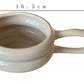 Ceramic measuring cup with dimensions and capacity details on a white background