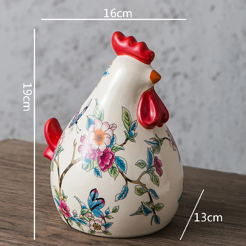 Ceramic rooster-shaped vase with floral designs and measurements on a wooden surface.