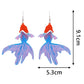 Blue and purple fish-shaped earrings with measurements on a white background