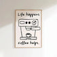 Framed artwork with a coffee machine illustration and 'Life happens, coffee helps.' text on a white wall.