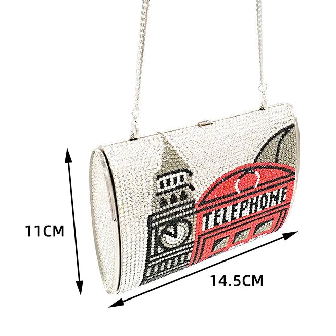 Designer handbag with London-themed design and measurements on a white background