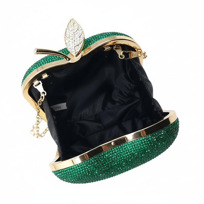 Red and gold clutch bag with black interior on a white background