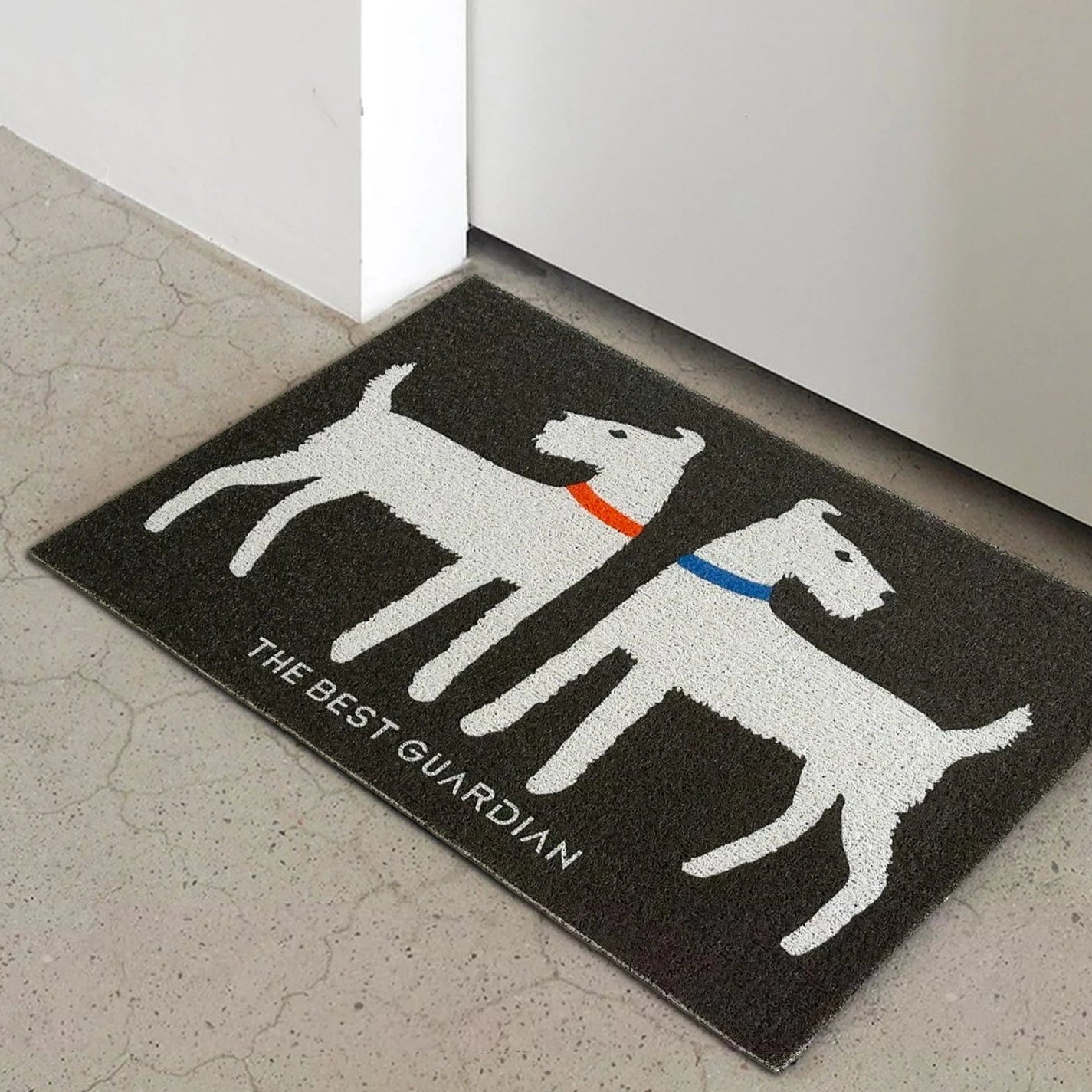 Doormat with dog design and text 'The Best Guardian' on a floor.
