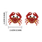 Red crab-shaped earrings with measurements and weight on a white background