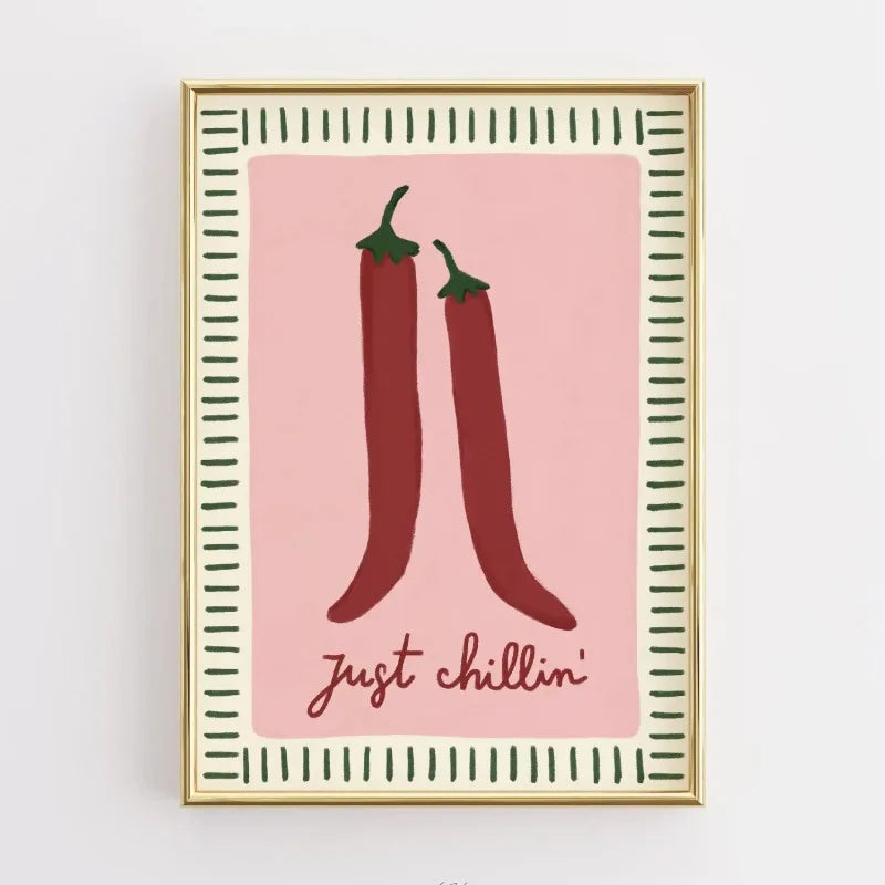 Framed artwork with two red chili peppers and 'Just Chillin'' text on a pink background