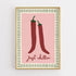 Framed artwork with two red chili peppers and &