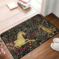 Decorative doormat with unicorn and deer design on a wooden floor.