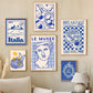 Collection of framed posters on a wall with a neutral color scheme.