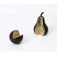 Two decorative pears with gold and black finishes on a white background