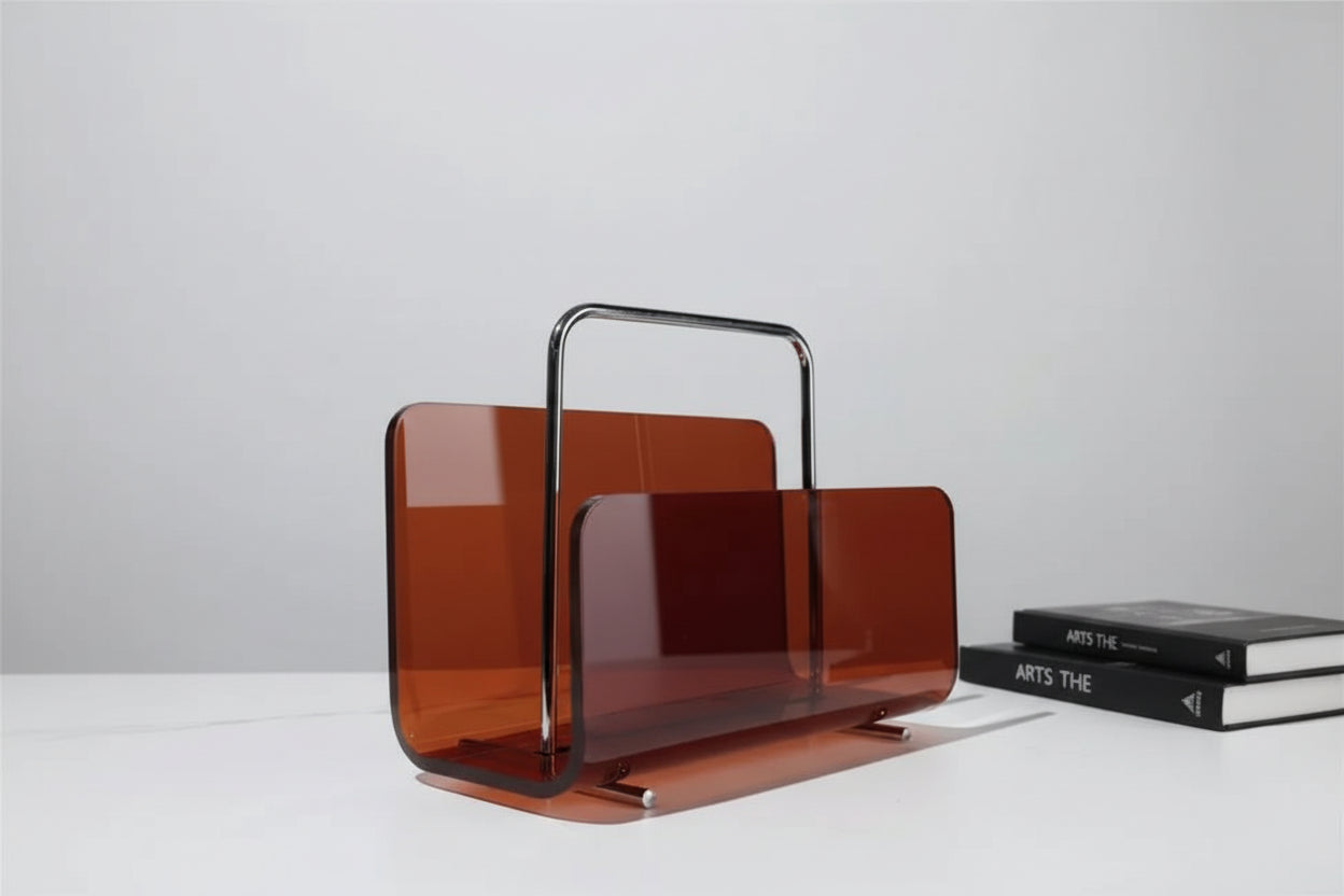 A modern clear acrylic and metal bookshelf decoration positioned on a white surface, with the brand 'Joylove' visible on the side.