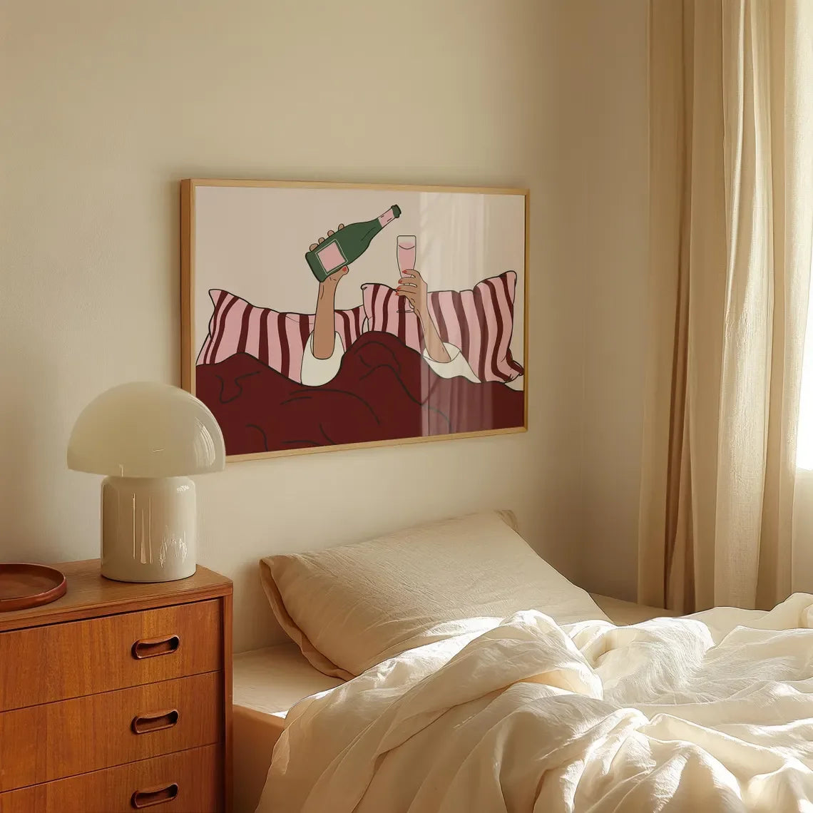 Room interior with a bed, wooden nightstand, and framed artwork on the wall.