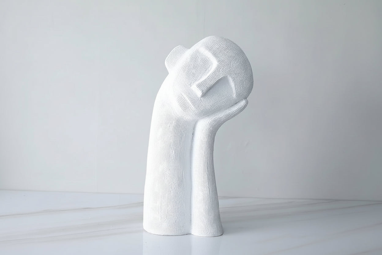 A white crooked head sleeping figures resin ornament, measuring 36cm in height, placed on a flat surface.