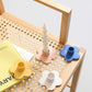 Decorative items on a wooden table with a white background