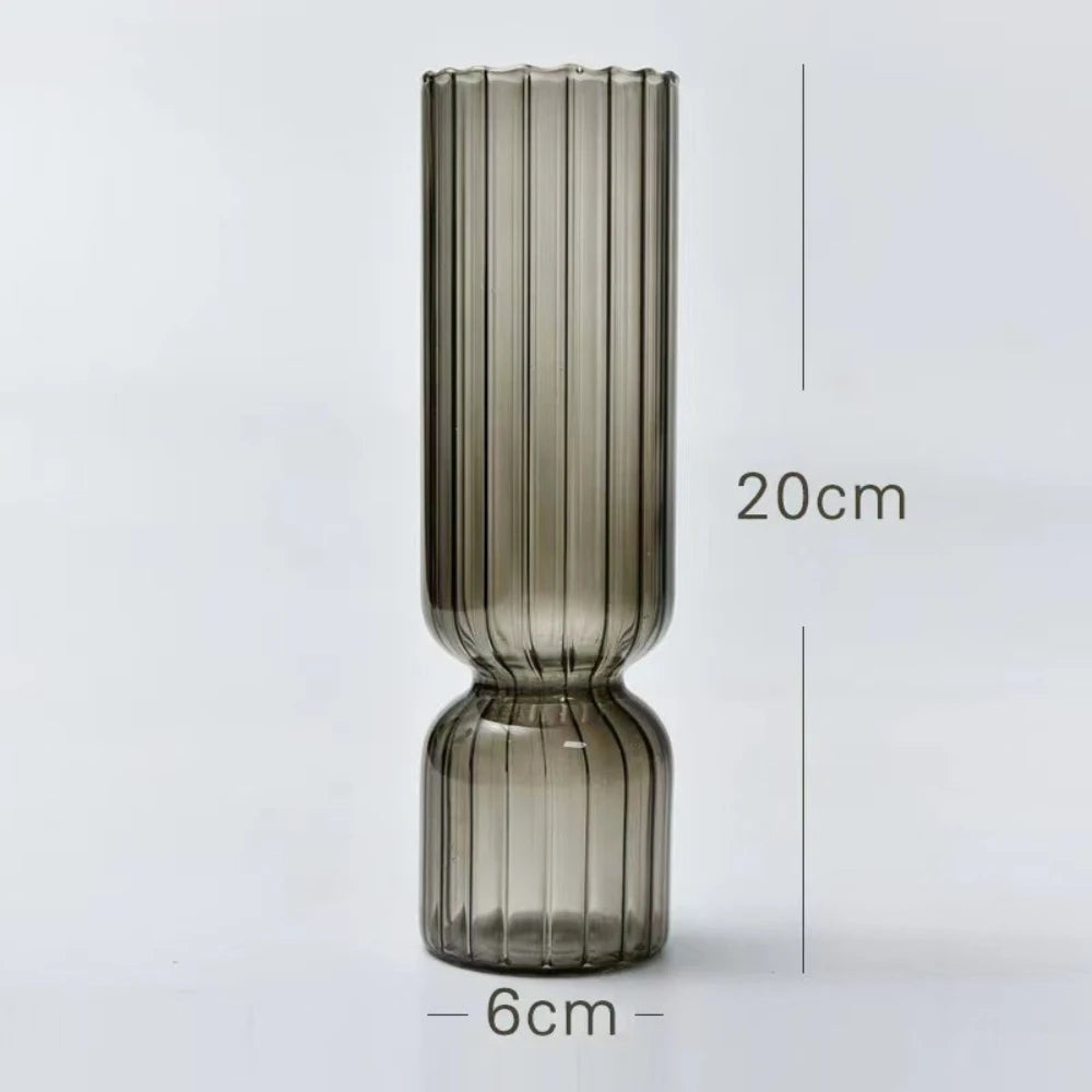 Smoky glass vase with dimensions on a light gray background