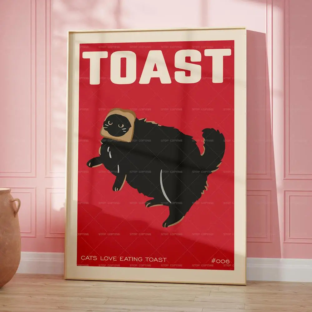 Framed poster with a black cat wearing a toaster costume on a red background, text 'TOAST' and '#006'.