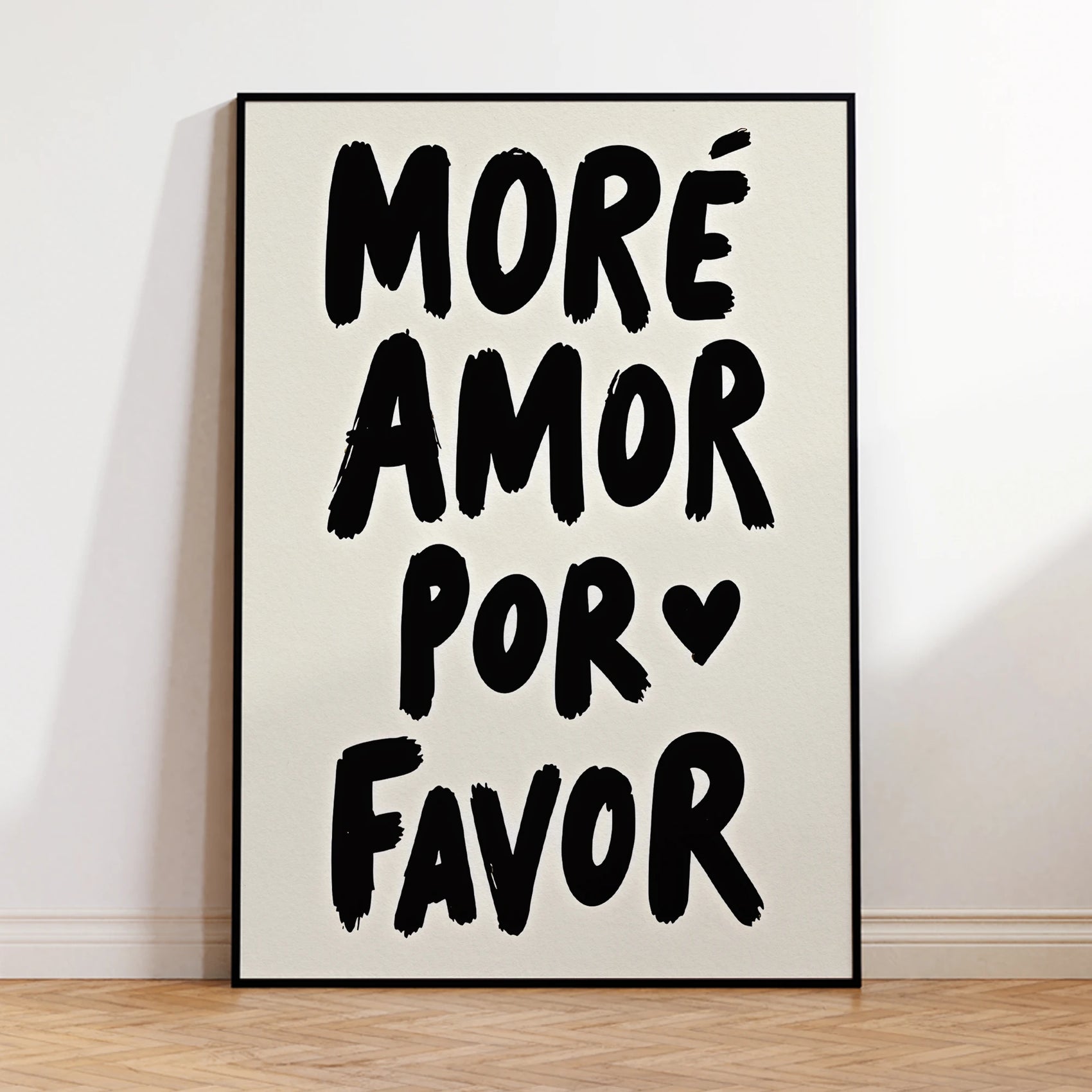 Framed artwork with 'Máre Amor Por Favor' text on a beige background