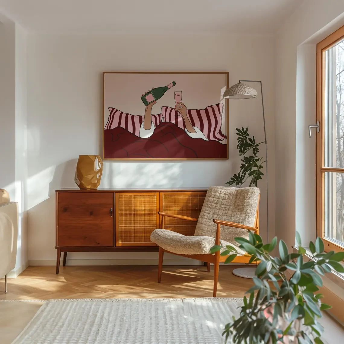 Living room with wooden cabinet, armchair, and abstract painting on the wall.