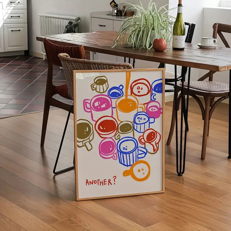 Colorful children's drawing of ice cream cones on a wooden floor in a room with a dining table and chairs.