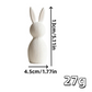 White rabbit-shaped object with measurements and weight on a white background