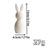 White rabbit-shaped object with measurements and weight on a white background
