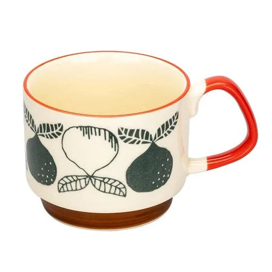Ceramic mug with red handle and pear design on a white background
