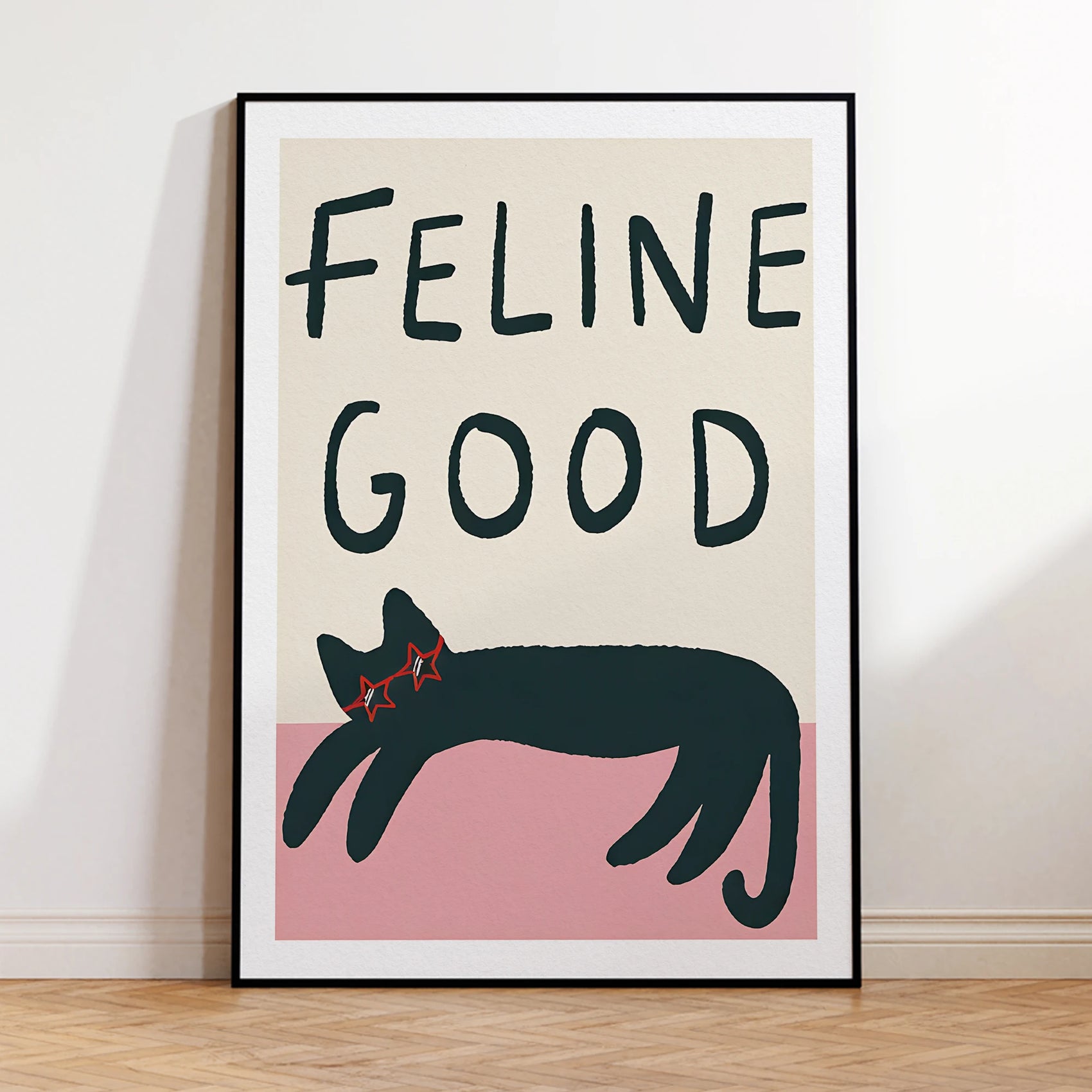 Poster with 'Feline Good' text and a cat illustration on a beige background