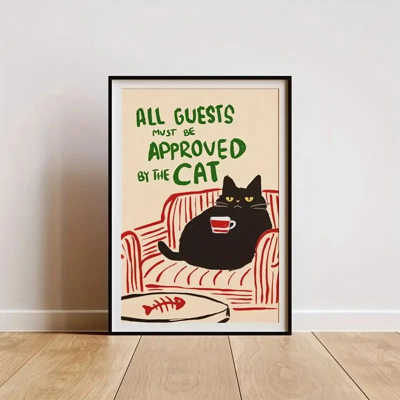 Framed poster with a cat on an armchair and text 'All guests must be approved by the cat' on a beige background.