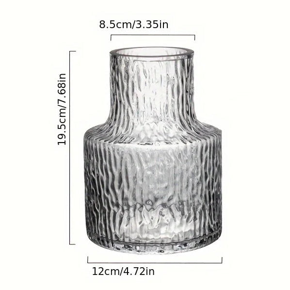 Clear glass vase with dimensions labeled on a white background