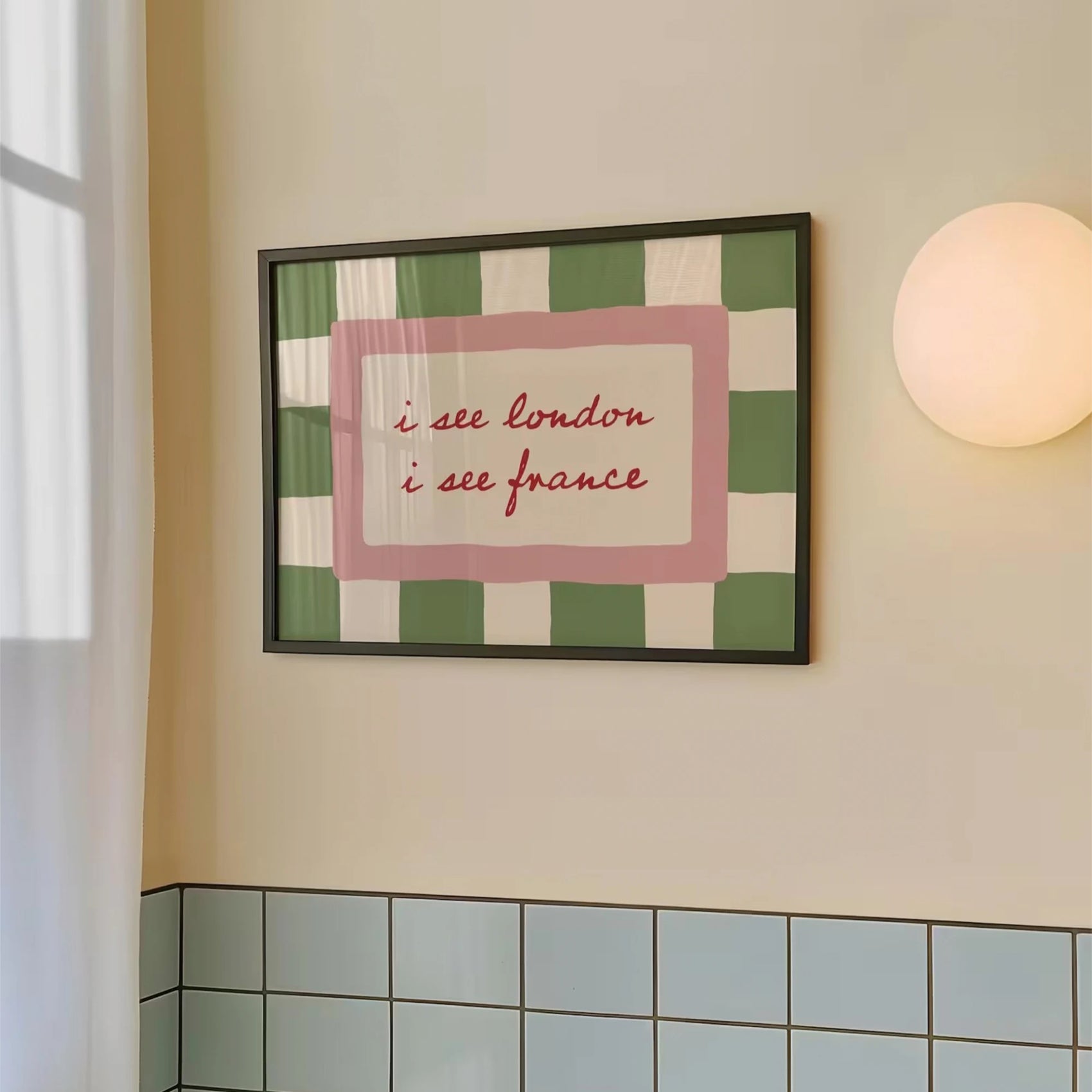 Framed checkered artwork with text on a wall above tiled floor