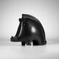 A black and white ceramic wild boar shaped ornament.