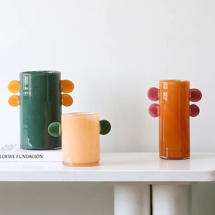 Colorful sculptural vases displayed together for modern eclectic home decor