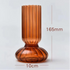 Brown ribbed vase with measurements on a light gray background