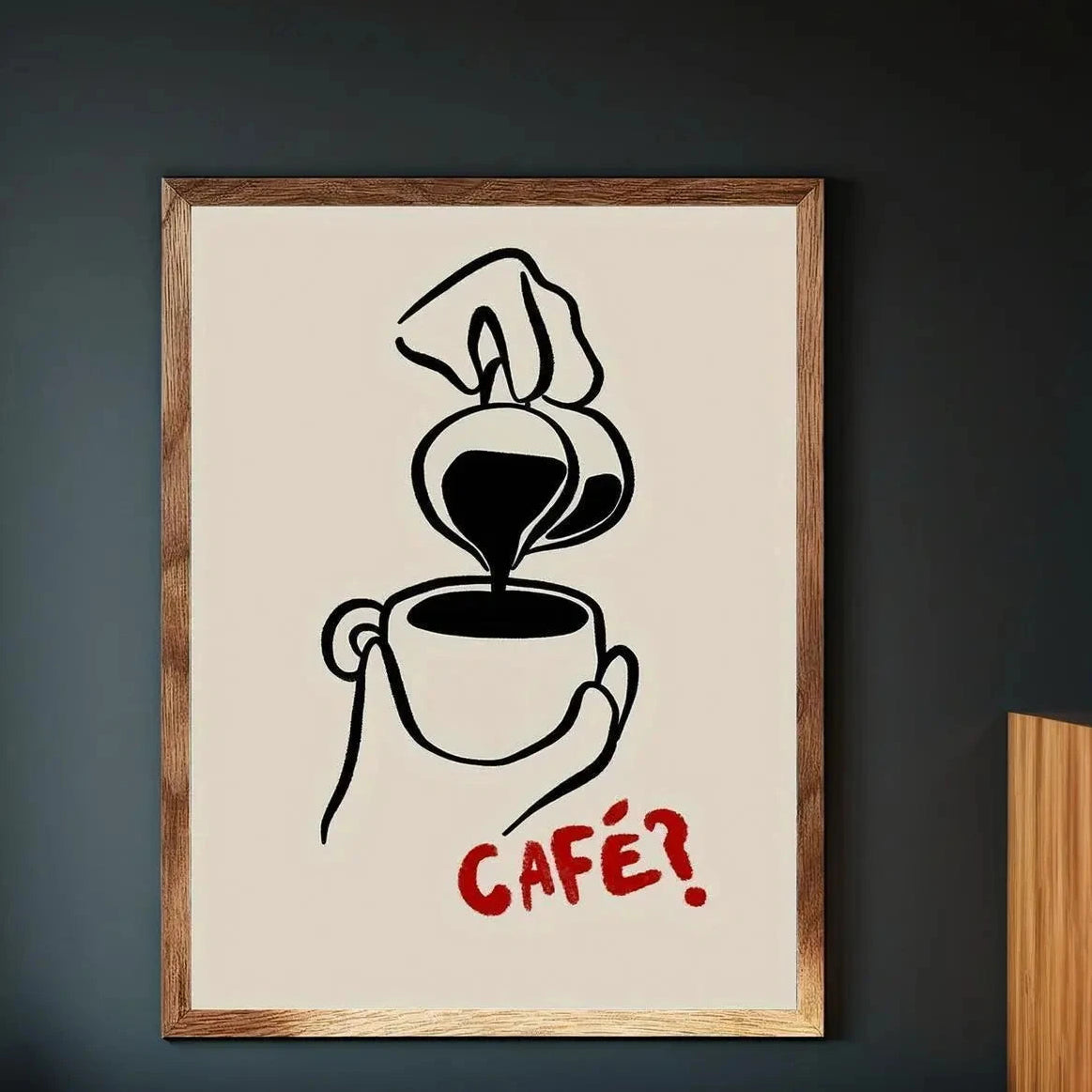Framed artwork with a coffee-themed design on a dark wall.