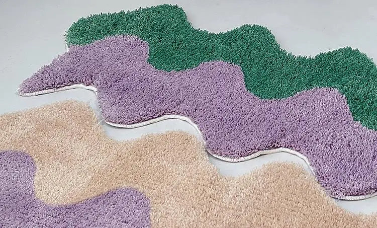Wavy-patterned carpets in purple, green, and beige on a light gray background