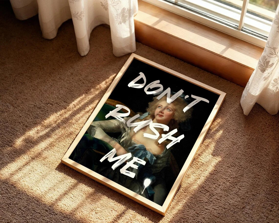 Framed artwork with text 'Don't Rush Me' on a carpeted floor.