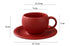 Red coffee cup and saucer with dimensions on a white background
