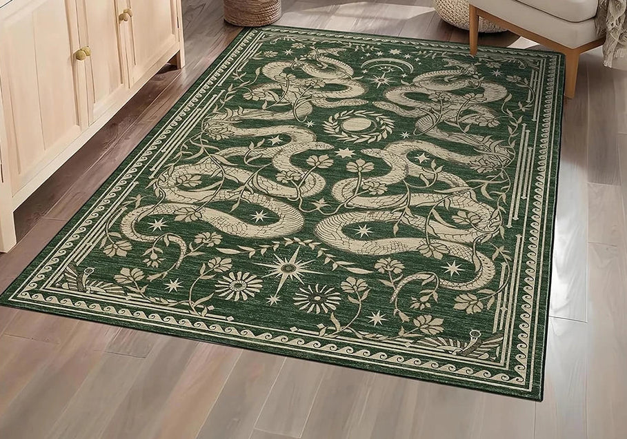 Decorative green rug with white patterns on a wooden floor.