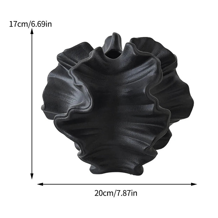 Black textured vase with dimensions indicated on a white background