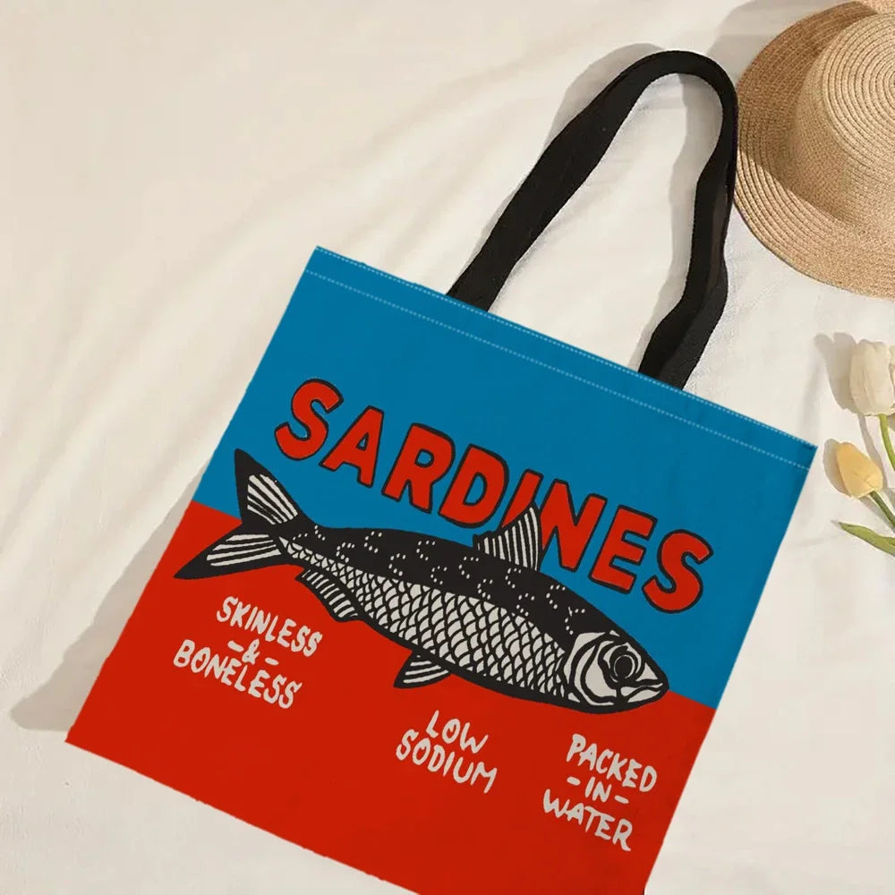 Tote bag with sardine label design on a light background