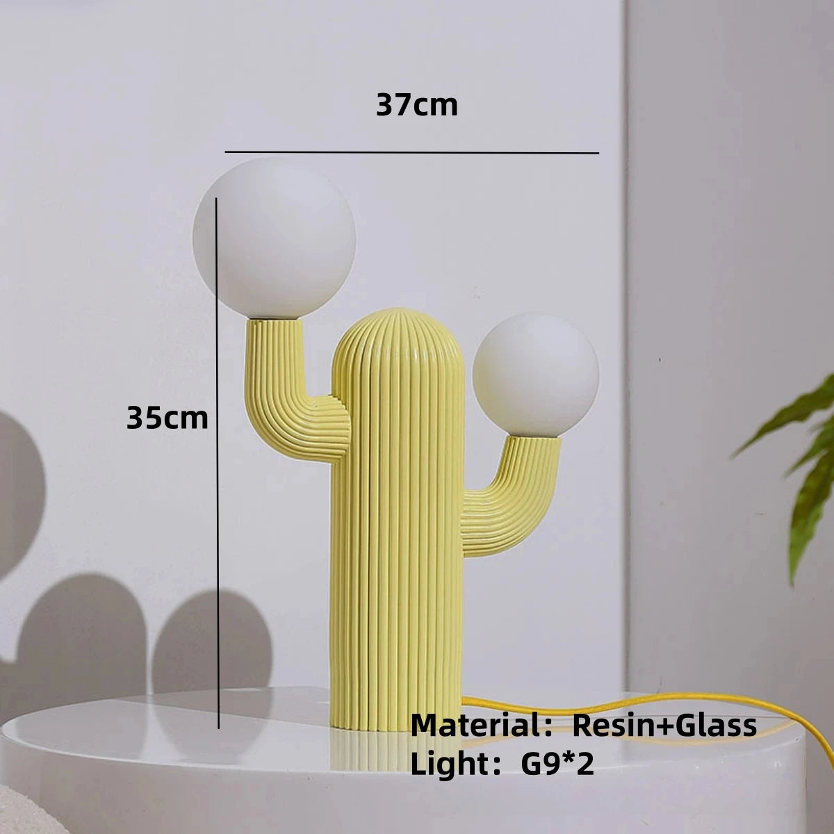 Cactus-shaped lamp with dimensions and material details on a white background