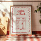 Framed artwork with 'coffee a clock' text and espresso machine illustration on a tiled wall.