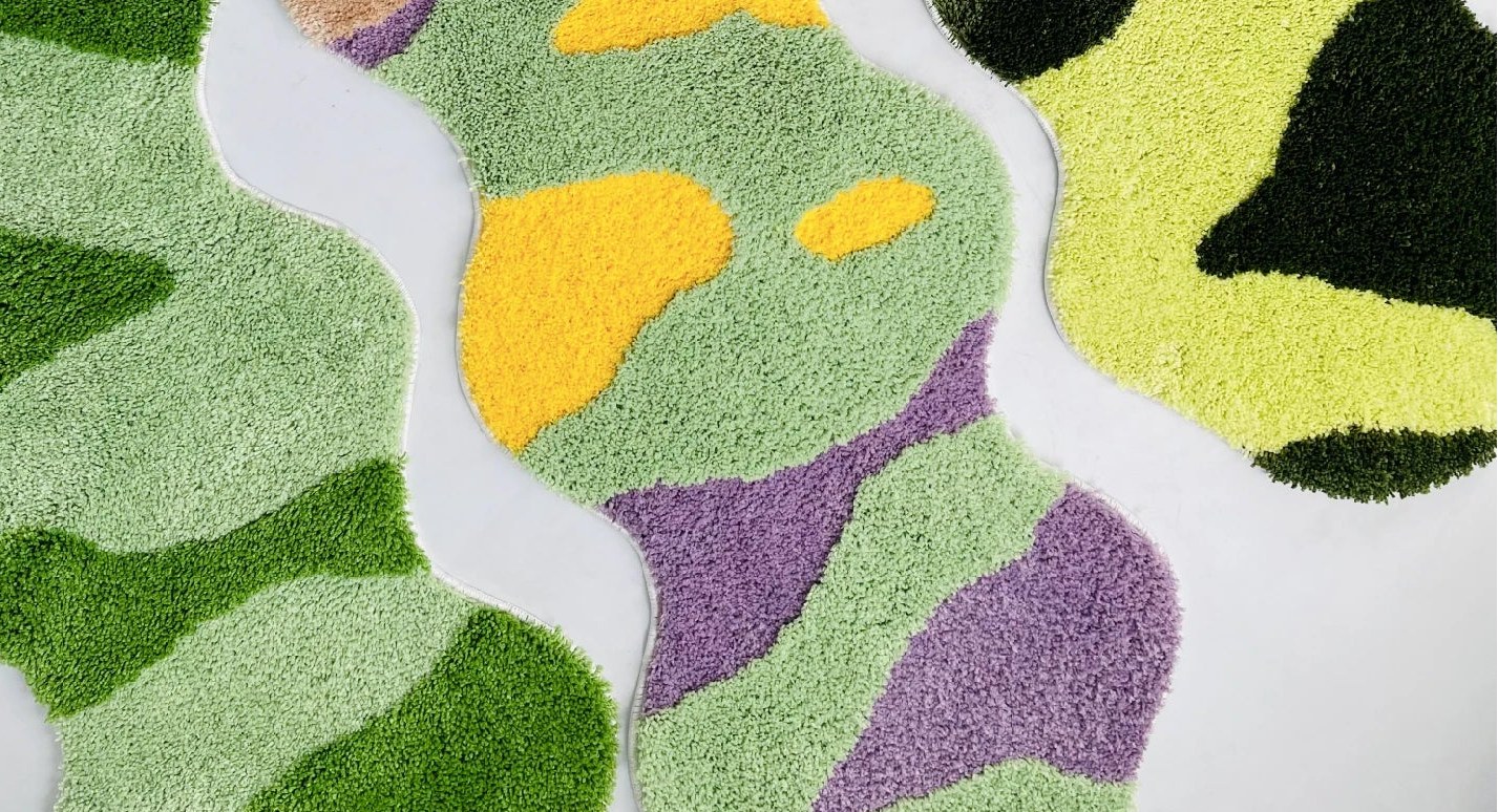 Colorful textured surface with green, purple, and yellow patterns