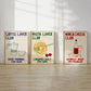 Three framed prints titled 'Coffee Lover Club', 'Pasta Lover Club', and 'Wine & Cheese Club' on a wooden floor.